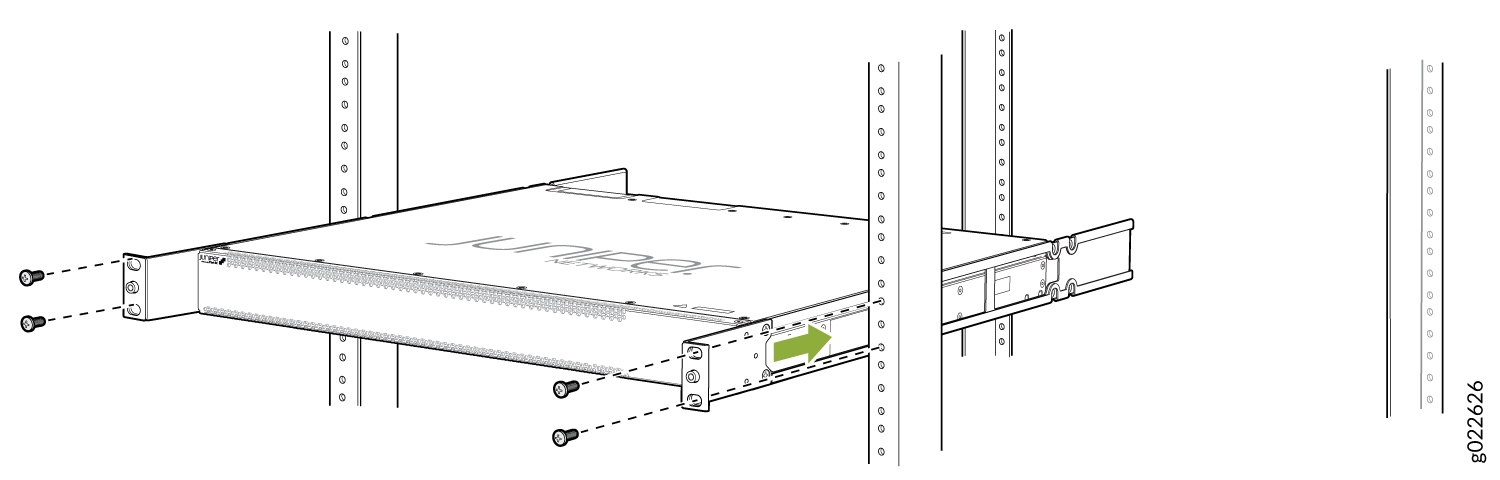 Juniper Networks device installation in equipment rack with focus on connection point indicated by green arrow.