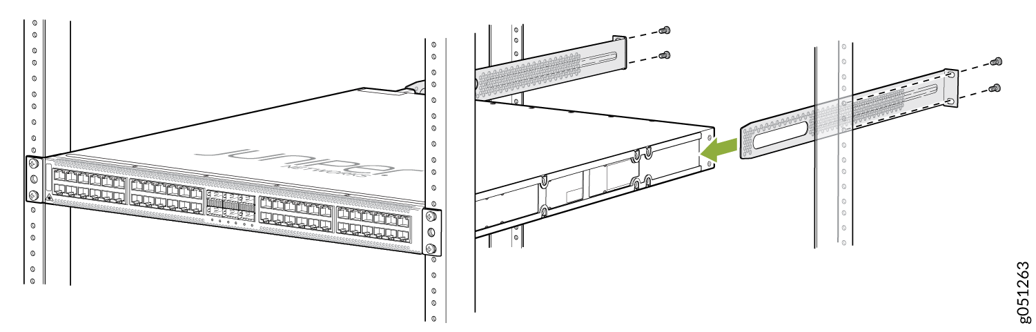 Installing a Juniper Networks device into a rack with brackets and screws in a data center setup.