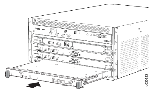 Juniper Networks modular router with a module being inserted or removed, used in data centers for routing and switching.