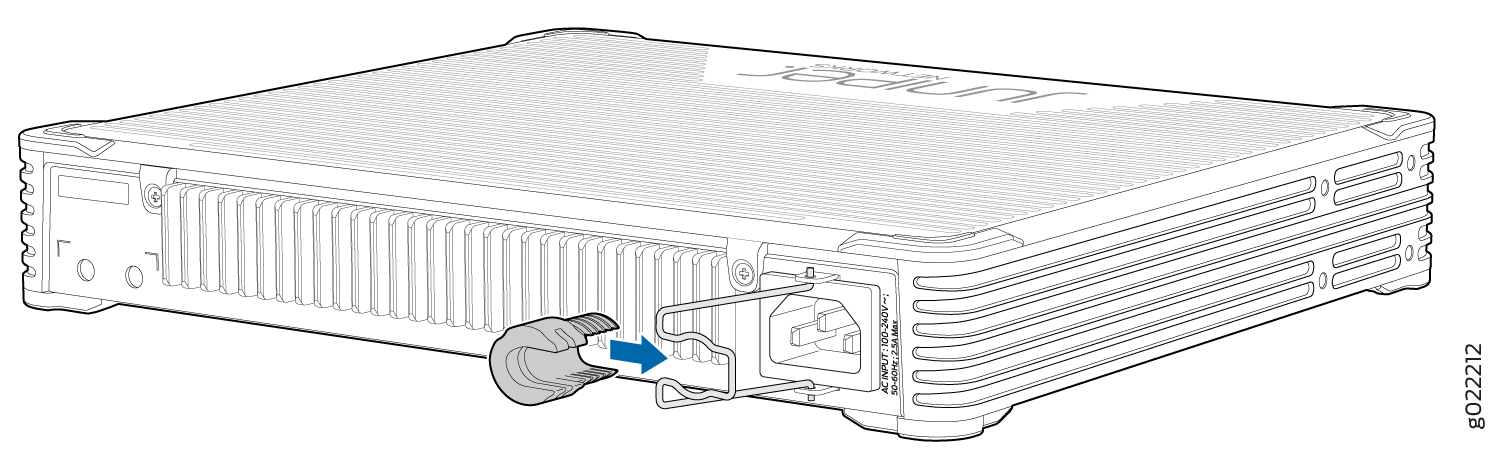 Juniper Networks device power input area with a blue arrow indicating the direction to insert the power cord into the socket.