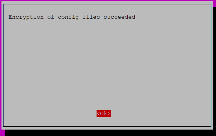 Encryption of config files succeeded. Red button labeled Ok to acknowledge the message.
