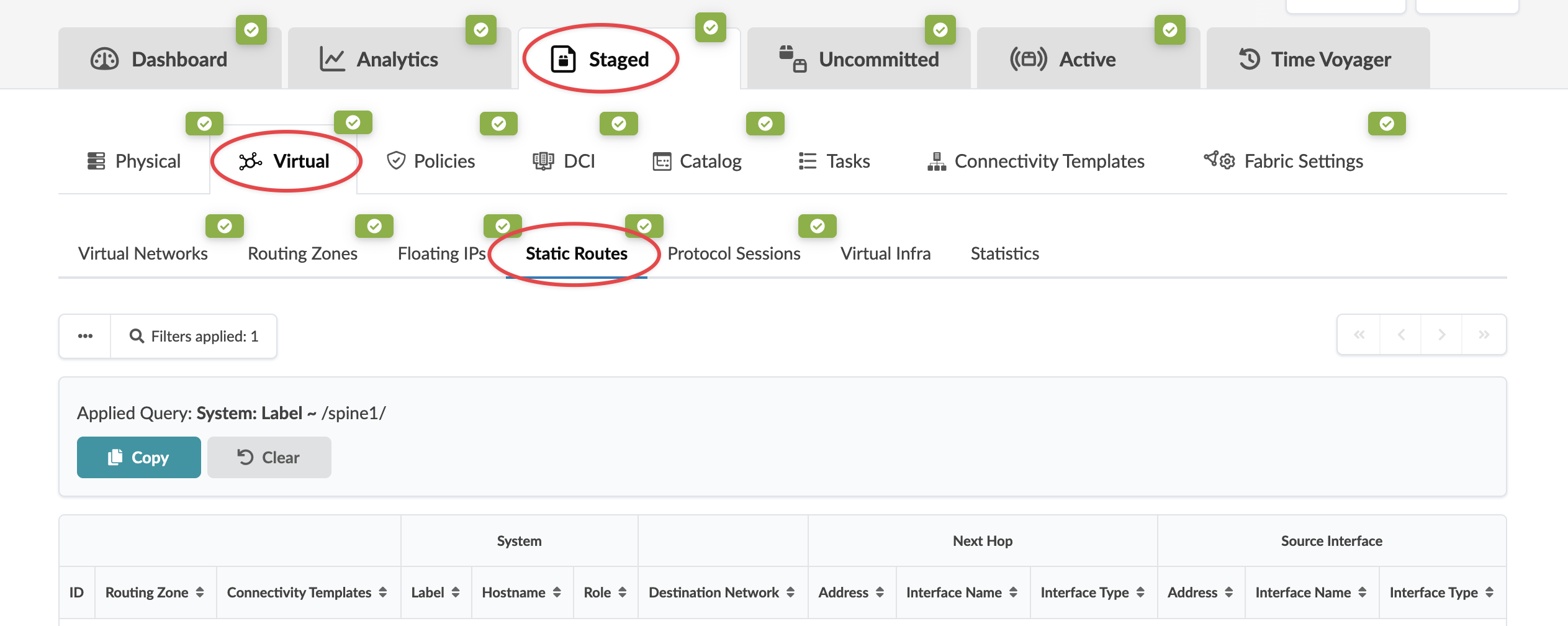 User interface of a network management tool with tabs for Dashboard, Analytics, Staged, Uncommitted, Active, and Time Voyager. Virtual and Static Routes sections are highlighted. A filter query System: Label ~ /spine1/ is applied with options to Copy or Clear. Table with columns like ID, Routing Zone, and Destination Network is empty.