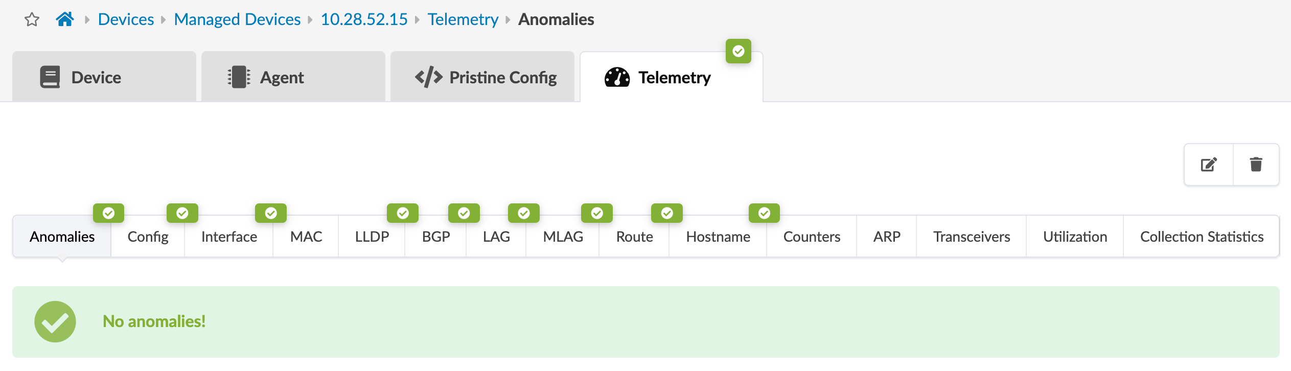Network management interface showing telemetry data for device IP 10.28.52.15; all tabs have green checkmarks; no issues detected.