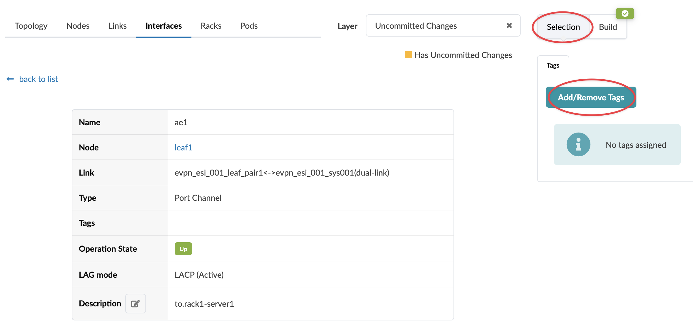 User interface showing network interface ae1 on node leaf1 with link evpn_esi_001_leaf_pair1 to evpn_esi_001_sys001 dual-link. Type is port channel, state is up in green, LAG mode is LACP active, description is to.rack1-server1. No tags assigned, option to add or remove tags, uncommitted changes indicated, selection mode active, build option available.