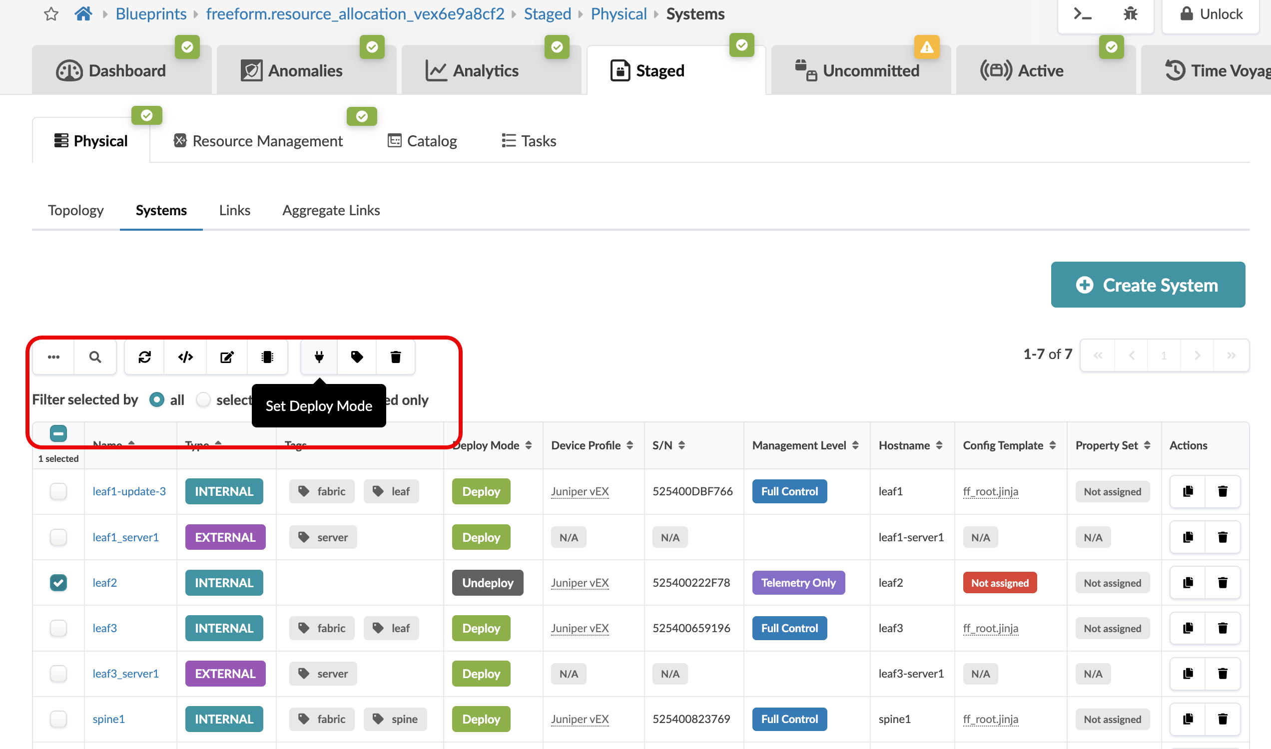 Dashboard interface for managing physical systems, showing tabs like Physical and Systems, a table listing system details such as name, type, tags, deploy mode, and actions, with a Create System button on the toolbar.