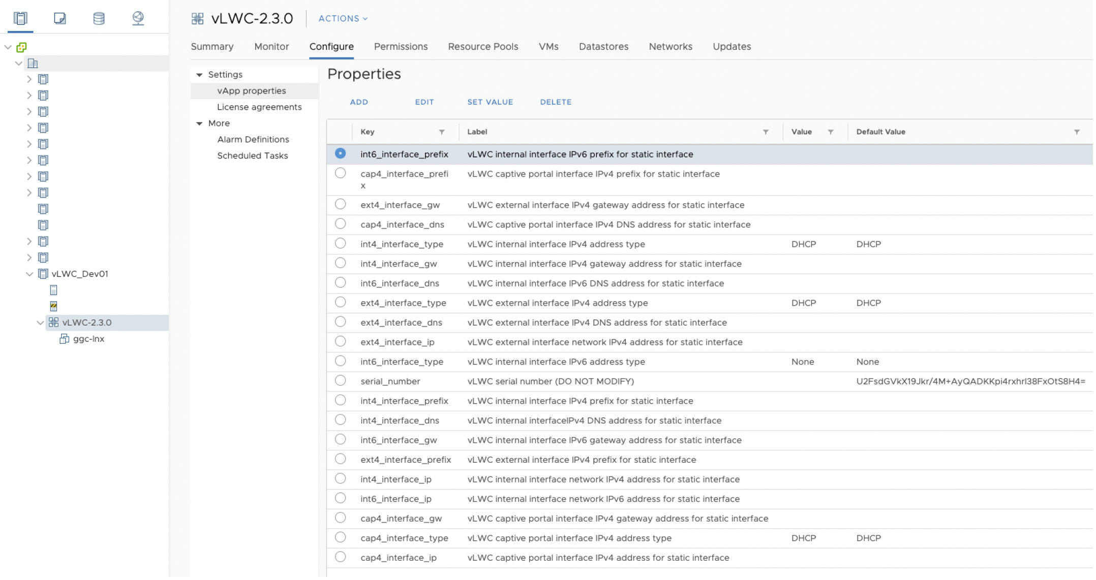 Configuration interface for vApp vLWC-2.3.0 in VMware vSphere showing properties like network settings and DNS configurations.