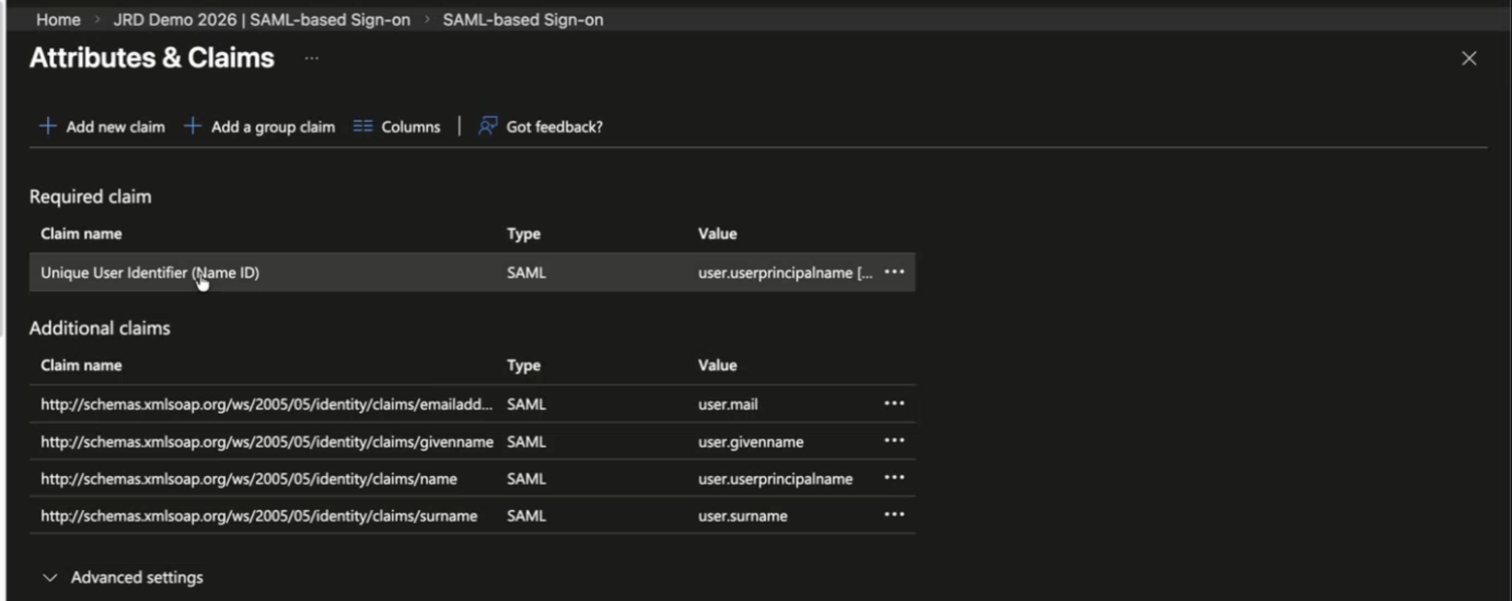 Configuration screen for Attributes and Claims in a SAML-based SSO setup, showing required claim Name ID mapped to user.userprincipalname and additional claims for emailaddress, givenname, name, and surname mapped to corresponding user attributes. Options include adding claims, grouping claims, adjusting columns, advanced settings, and feedback.