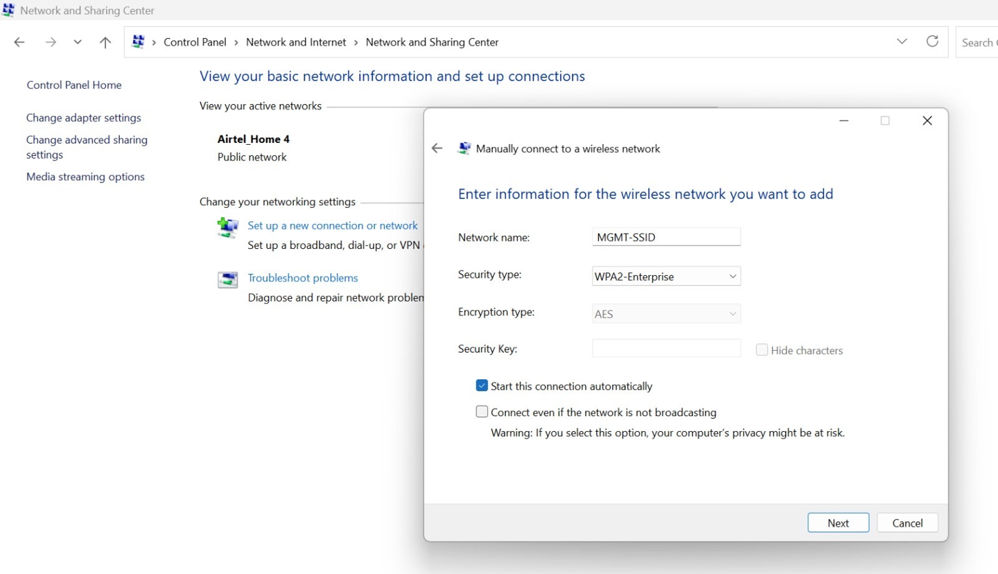 Manually connecting to a wireless network in Windows Control Panel. Network name is MGMT-SSID with WPA2-Enterprise security and AES encryption. Security key field is empty. Options to start connection automatically and connect if not broadcasting are shown.