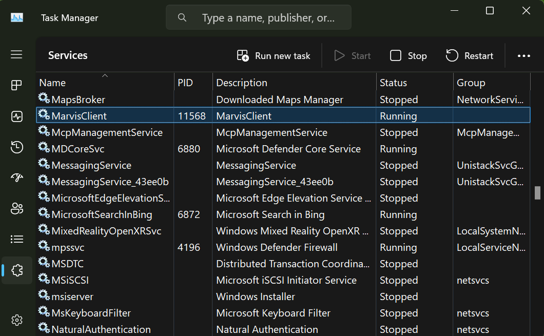 Services tab in Windows Task Manager displaying system services with columns for Name, PID, Description, Status, and Group. MarvisClient highlighted as running with PID 11568.