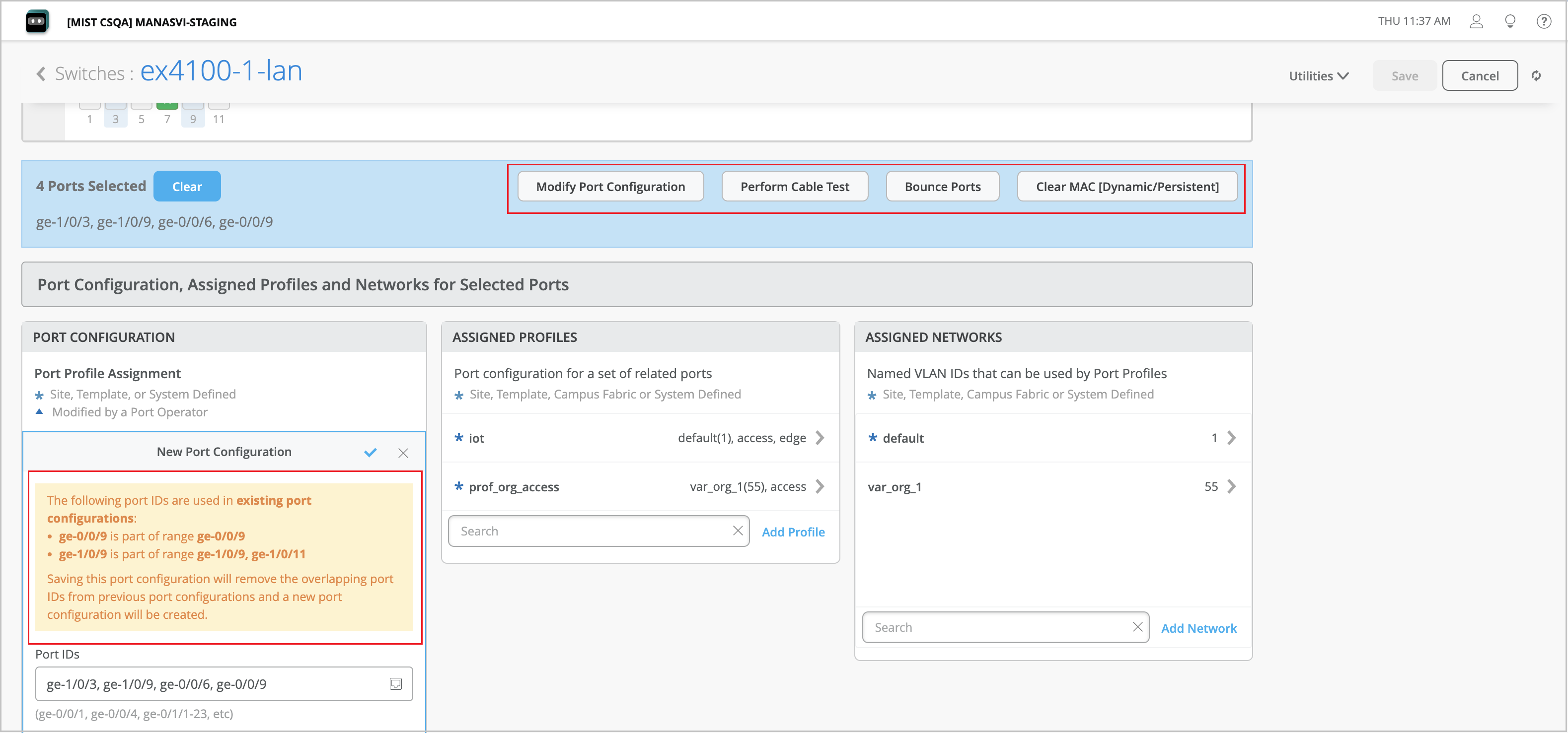 Network management interface for configuring switch ports on ex4100-1-lan; selected ports include ge-1/0/3, ge-1/0/9, ge-0/0/6, ge-0/0/9; options for port modifications, cable tests, bounce ports, and clearing MAC addresses; warning about removing ports from existing configurations; profiles assigned like iot and prof_org_access; VLANs like default and var_org_1.