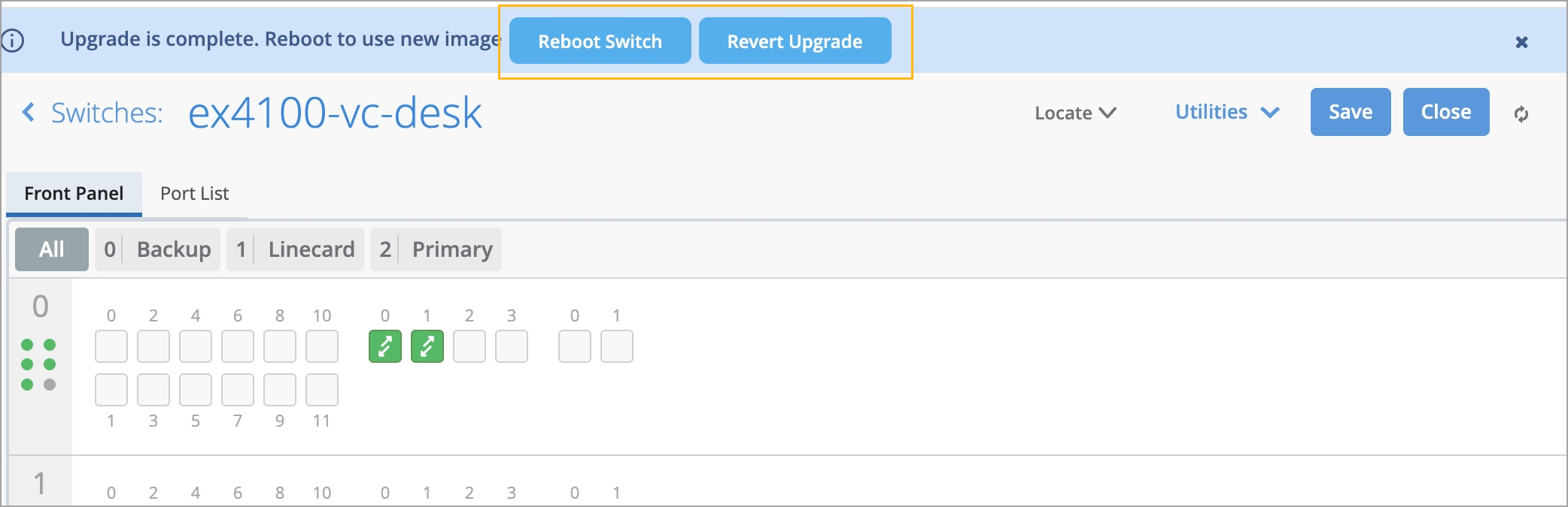 Network switch GUI showing upgrade completion. Prompts: 'Reboot Switch' and 'Revert Upgrade'. Front Panel view with active ports in green. Tabs: Port List, Backup, Linecard, Primary. Options: Save, Close, Utilities.