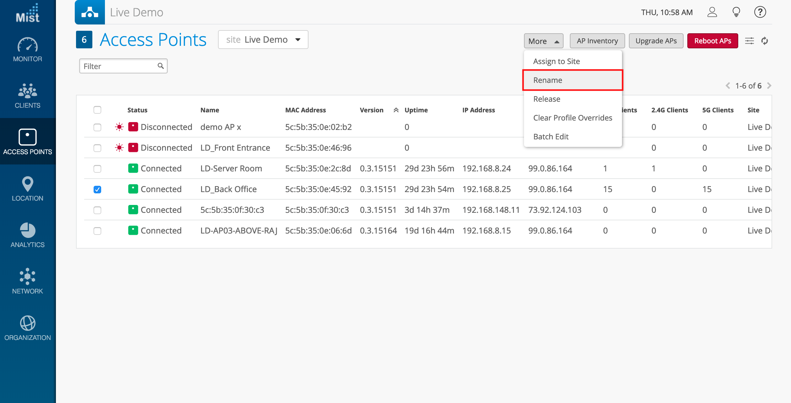Mist dashboard for managing wireless access points showing access points list with status, name, MAC address, and client counts. Navigation on left, rename option highlighted in action menu.